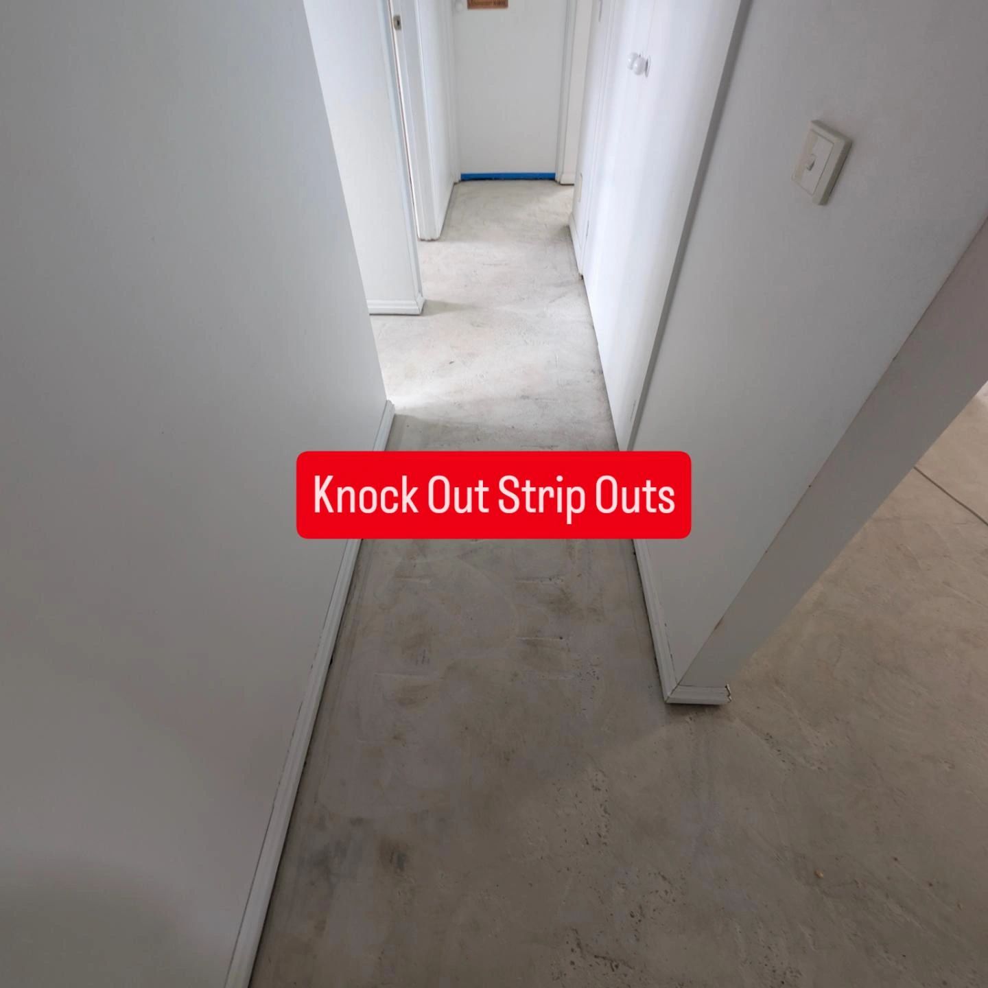 Overhead view of hallway with concrete floor