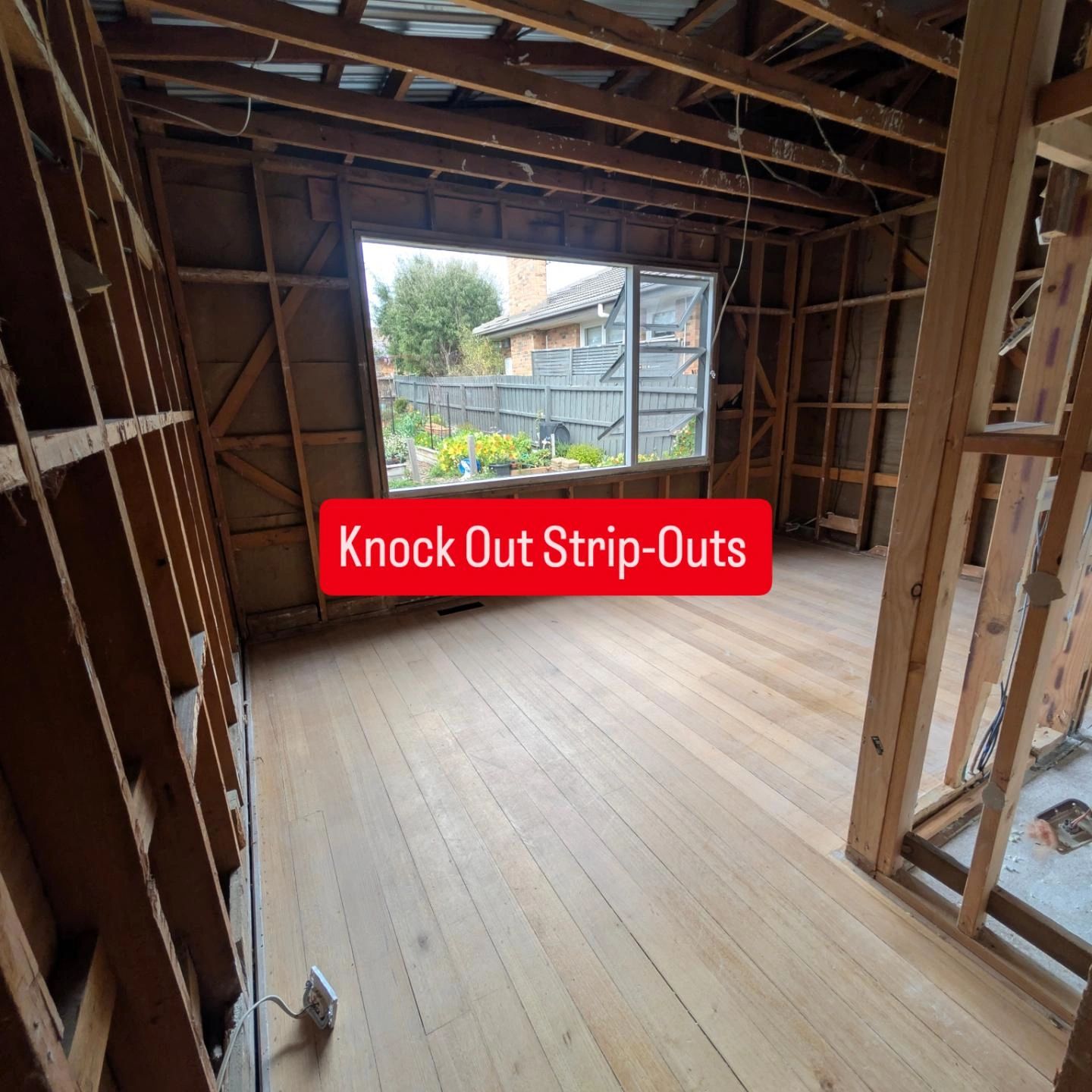 Residential renovation with exposed framing and windows